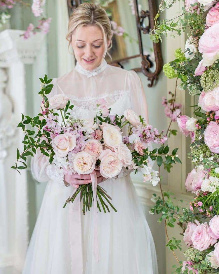 Bride Holding Wedding Bouquet David Austin Pink Roses