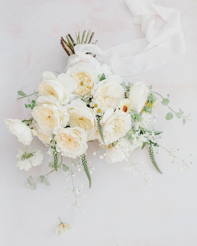 Patience quintessential ivory wedding rose bouquet