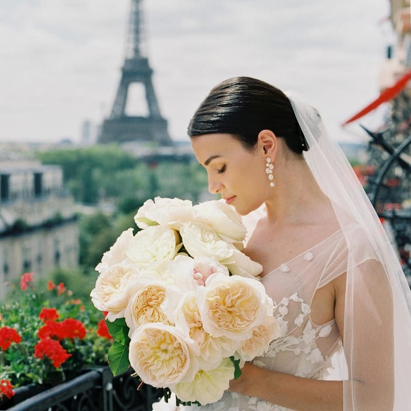 Bride And Bridal Bouquet In Front Of Eiffel Tower
