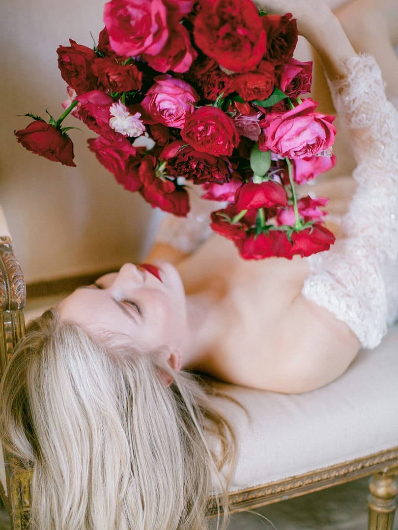 Bride Looking At Wedding Bouquet