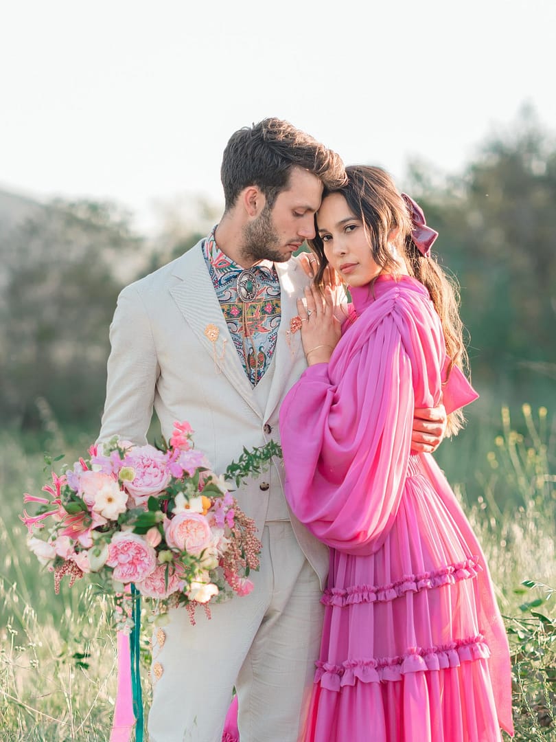 Bride And Groom Holding Wedding Bouquet